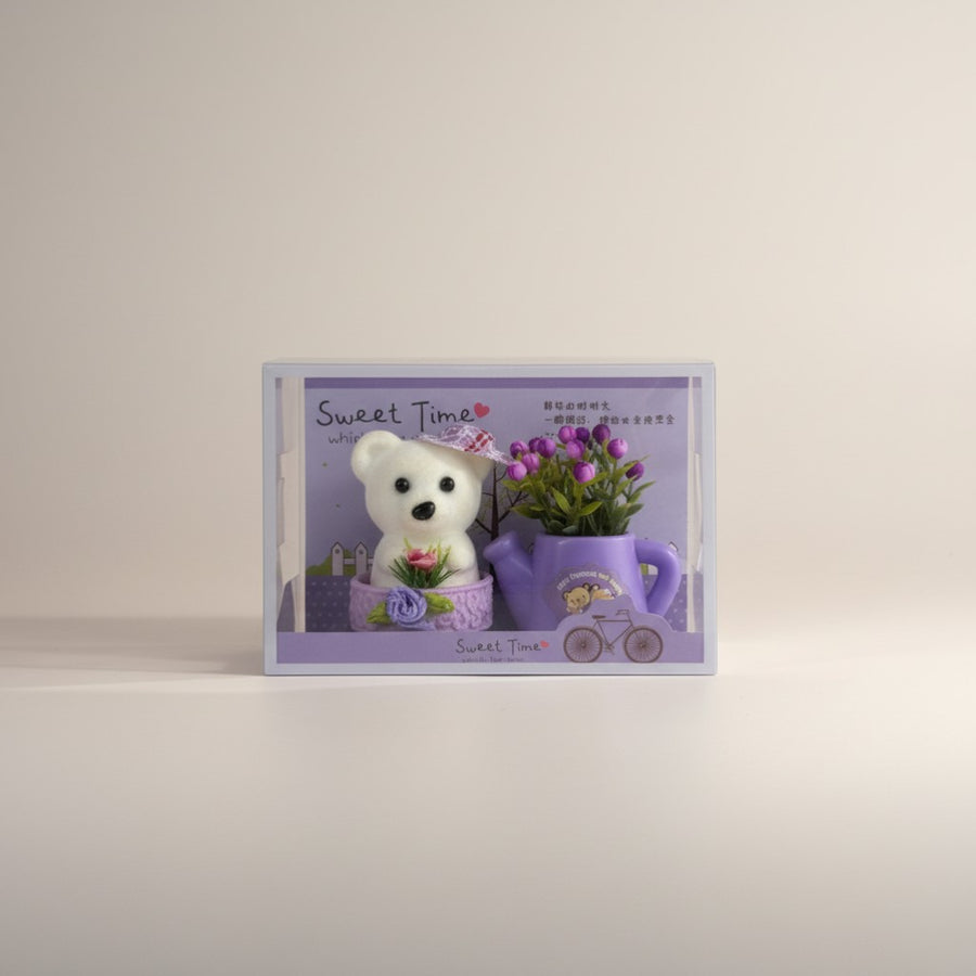 eRamis white teddy bear figurine with purple flowers and watering can decoration.