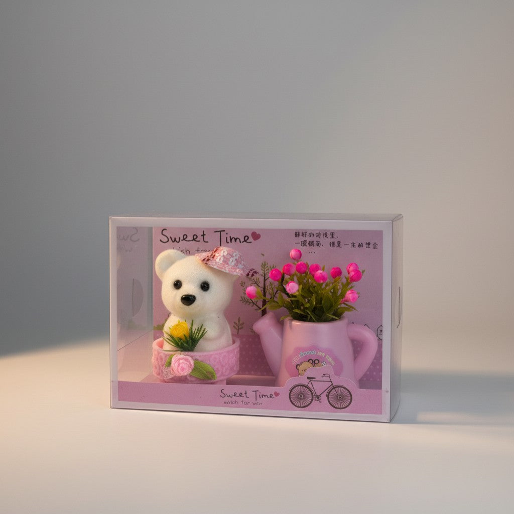 eRamis white teddy bear with pink hat and yellow flower, next to pink watering can with pink flowers.